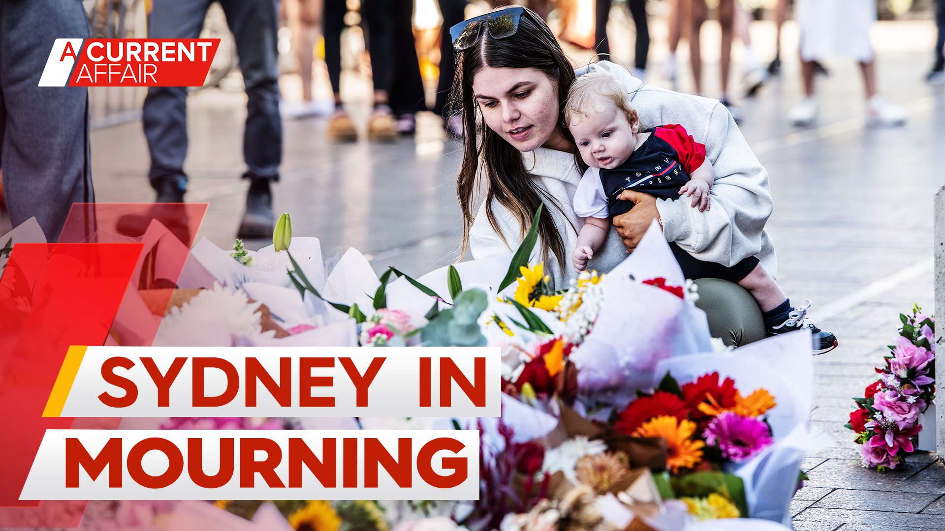 Bondi Junction awash with flowers as city mourns lives lost